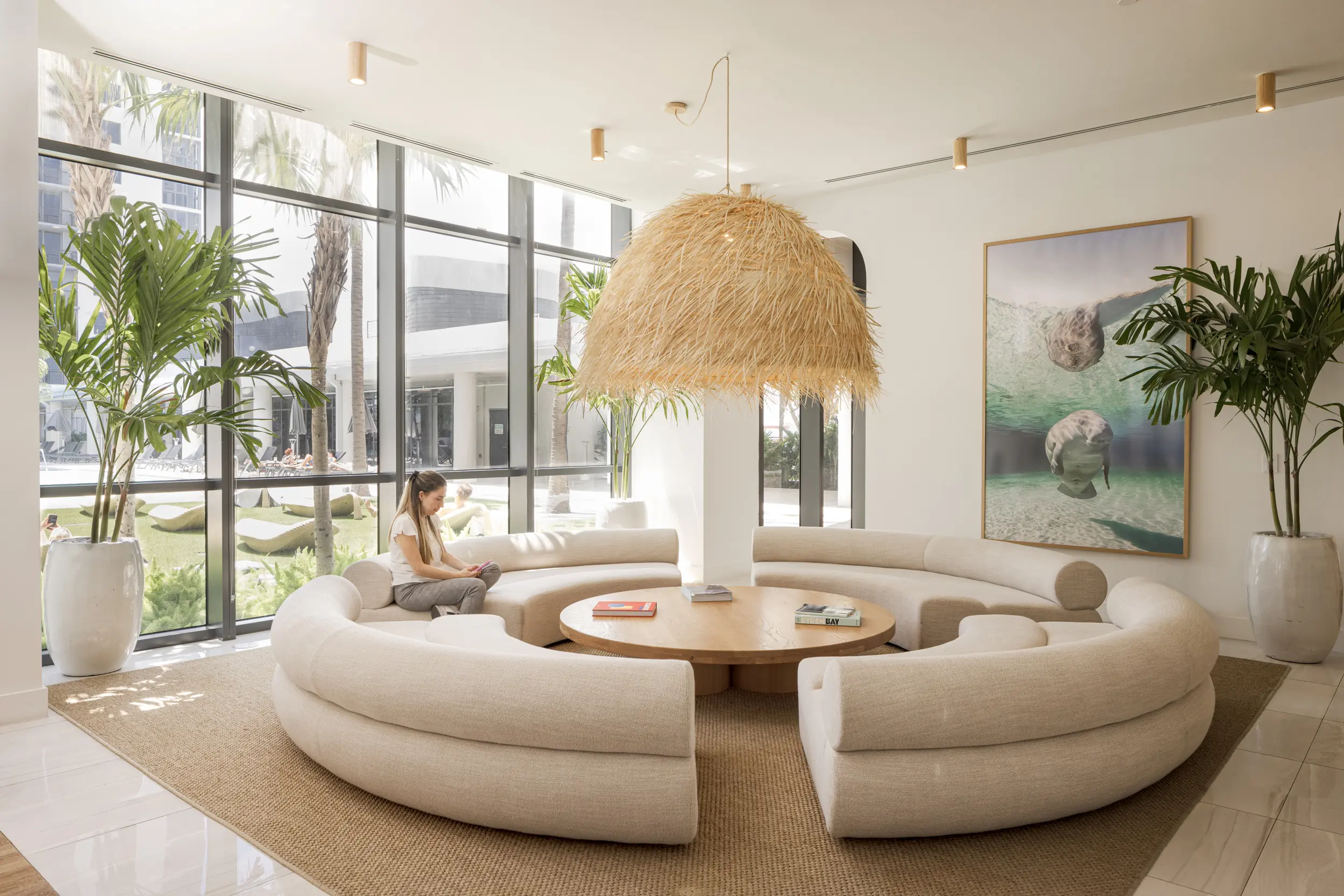 Central lounge area with curved seating and natural light